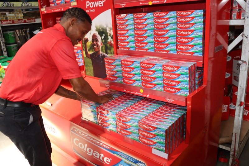 Retail Brand Champion replenishing a shelf